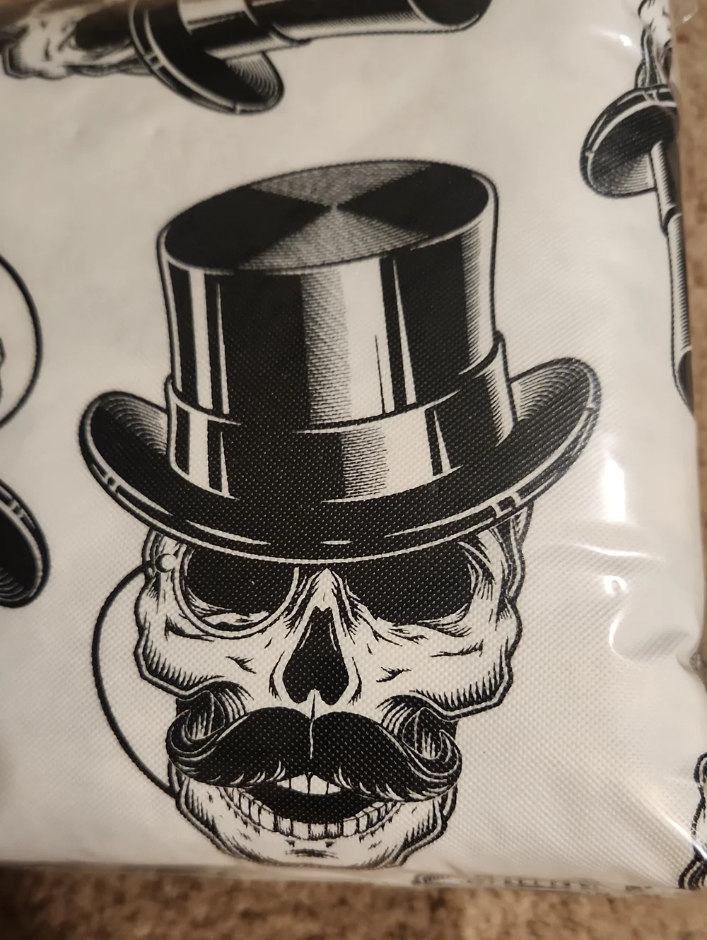 Brand new Halloween Vinyl Tablecloth. White with Black Skull & Top Hat Pattern
